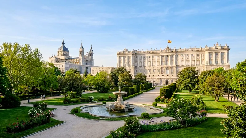 Royal Palace of Madrid rising above the green Campo del Moro gardens